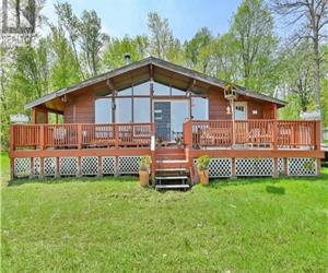 Moira Lake Retreat, cozy 3 bedroom rustic cottage with modern amenities. Best fishing lake around.