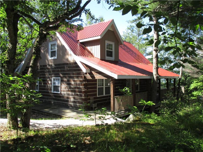 Rustic Family Log Haven on Sharbot Lake Cottage Rental PL22234