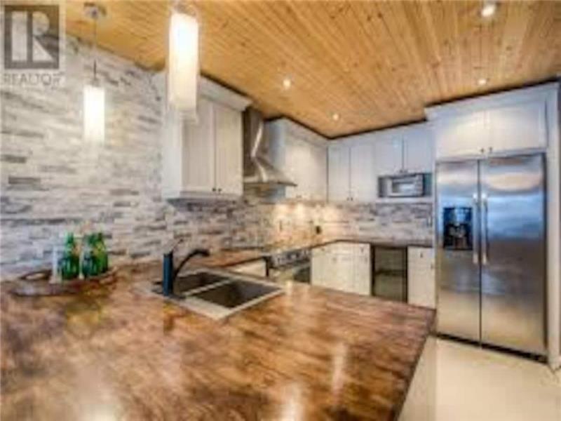 Kasa Kosecki lakeside suite with Puslinch Cottage Rental GL32033