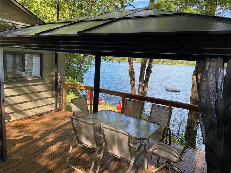 Relax and Unwind, Cozy Lakefront Sydenham Cottage Rental PL32905