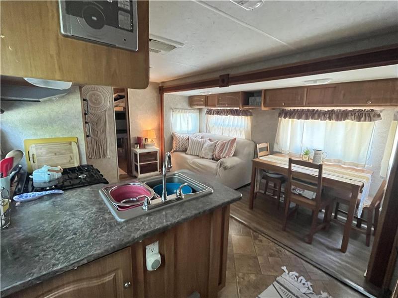 Trailer for sale on large lot by Dunnville Cottage for Sale FS