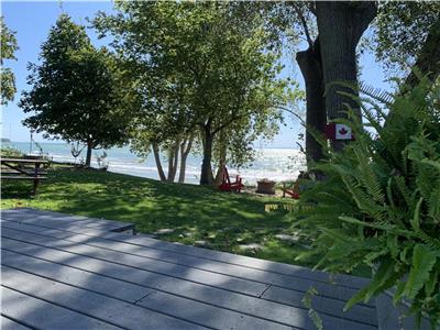 Lakefront Cottage right on beautiful sandy beach.
