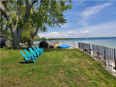 "Experience Lakeside Bliss: Relax in a Hot Tub and Roast Marshmallows by the Firepit"